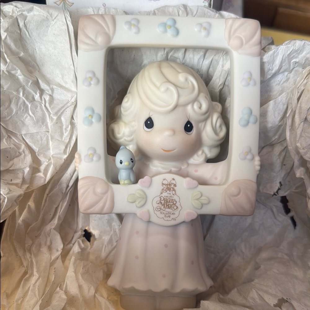 Adorable Figurine with Frame and Bird